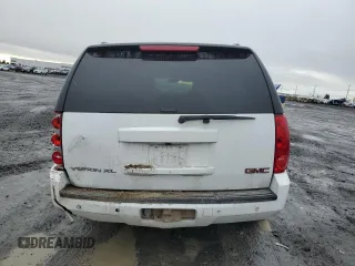 2013 GMC Yukon XL SLT z VIN 1GKS2KE74DR127036, wystawiony jako Copart lot #46916615 z przebiegiem 211 043 mil mil oraz Szkoda całkowita • Salvage title. Historia ofert i sprzedaży dostępna na DreamBid. Obrazek 6.