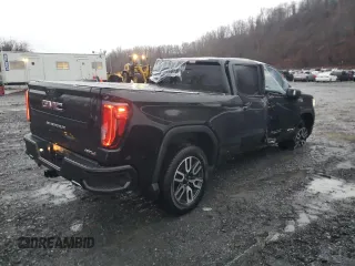 2021 GMC Sierra 1500 AT4 with VIN 3GTU9EET9MG326162, listed as a Copart auction lot 84890804 with 68,723 mi miles and Salvage Title. Bid and sale history available at carsss.com. Image 3.