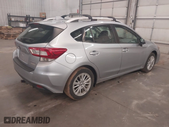 2017 Subaru Impreza Premium with VIN 4S3GTAB67H3740524, listed as a IAAI auction lot 42171963 with 148,495 mi miles and . Bid and sale history available at DreamBid. Image 4.