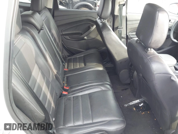 2019 Ford Escape Titanium with VIN 1FMCU9J97KUA03195, listed as a IAAI auction lot 42656589 with 40,099 mi miles and . Bid and sale history available at DreamBid. Image 8.