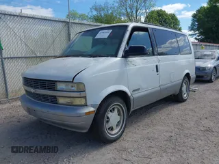 1999 Chevrolet Astro z VIN 1GNDM19W0XB116548, wystawiony jako IAAI lot #41943530 z przebiegiem 124 735 mil mil oraz . Historia ofert i sprzedaży dostępna na DreamBid. Obrazek 2.