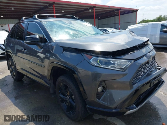 2021 Toyota RAV4 Hybrid XSE with VIN 2T3E6RFV8MW026973, listed as a IAAI auction lot 42052289 with 94,857 mi miles and . Bid and sale history available at DreamBid. Image 1.