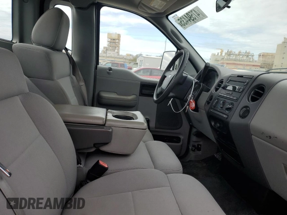 2006 Ford F-150 STX with VIN 1FTRF022X6KC52615, listed as a Copart auction lot 47594435 with 113,143 mi miles and Salvage Title. Bid and sale history available at carsss.com. Image 10.