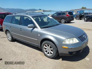 2004 Volkswagen Passat GLS z VIN WVWVD63B74E024668, wystawiony jako IAAI lot #42642773 z przebiegiem 167 507 mil mil oraz . Historia ofert i sprzedaży dostępna na DreamBid. Obrazek 1.