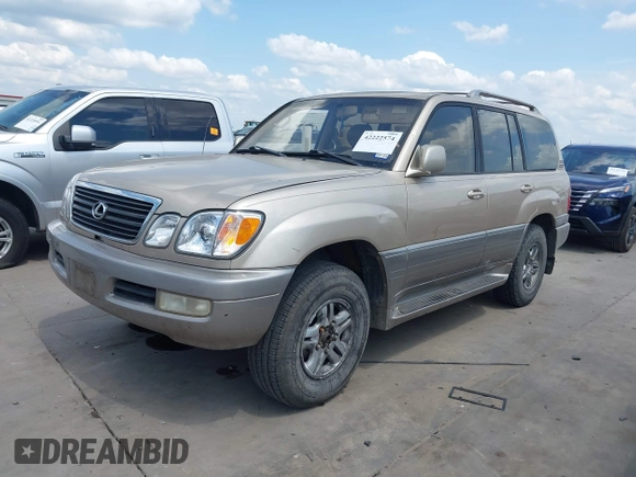 2001 Lexus LX 470 with VIN JTJHT00W713511796, listed as a IAAI auction lot 42222574 with 297,427 mi miles and . Bid and sale history available at carsss.com. Image 17.