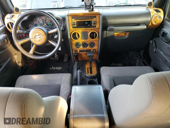 2008 Jeep Wrangler Unlimited X with VIN 1J4GB39168L649280, listed as a Copart auction lot 81379354 with 161,365 mi miles and Salvage Title. Bid and sale history available at DreamBid. Image 8.