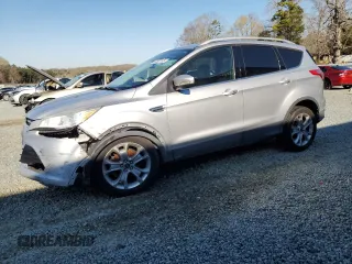 2014 Ford Escape Titanium with VIN 1FMCU0JX7EUD66921, listed as a Copart auction lot 50502105 with 170,624 mi miles and Salvage Title. Bid and sale history available at carsss.com. Image 1.