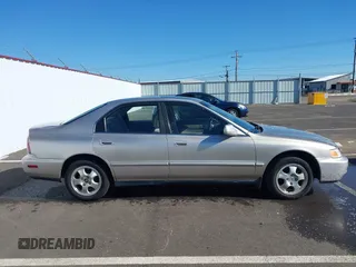 1997 Honda Accord Special Edition with VIN 1HGCD5603VA115569, listed as a IAAI auction lot 41636725 with 216,937 mi miles and . Bid and sale history available at carsss.com. Image 13.