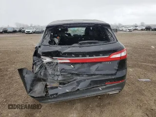 2016 Lincoln MKX Reserve z VIN 2LMTJ8LR6GBL21763, wystawiony jako Copart lot #52076805 z przebiegiem 151 418 mil mil oraz Szkoda całkowita • Salvage title. Historia ofert i sprzedaży dostępna na DreamBid. Obrazek 6.