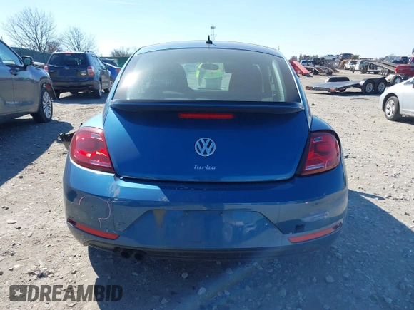 2018 Volkswagen Beetle S z VIN 3VWFD7ATXJM711734, wystawiony jako IAAI lot #41704497 z przebiegiem 66 702 mil mil oraz . Historia ofert i sprzedaży dostępna na DreamBid. Obrazek 16.