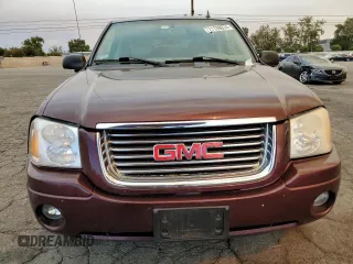 2007 GMC Envoy SLT with VIN 1GKDT13S072276581, listed as a Copart auction lot 71139974 with 271,760 mi miles and Salvage Title. Bid and sale history available at carsss.com. Image 5.