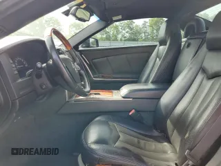 2006 Cadillac XLR z VIN 1G6YV36A265600782, wystawiony jako Copart lot #54352705 z przebiegiem 94 678 mil mil oraz Szkody całkowita. Historia ofert i sprzedaży dostępna na DreamBid. Obrazek 7.