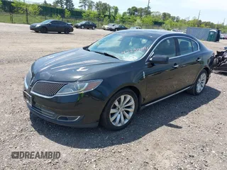 2013 Lincoln MKS with VIN 1LNHL9DKXDG601595, listed as a IAAI auction lot 42239041 with 224,537 mi miles and . Bid and sale history available at DreamBid. Image 2.