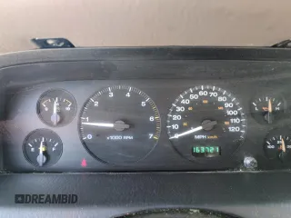 2004 Jeep Grand Cherokee Laredo with VIN 1J4GW48S54C363256, listed as a Copart auction lot 61862615 with 163,721 mi miles and Salvage title. Bid and sale history available at DreamBid. Image 9.