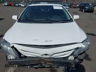 2011 Toyota Corolla L with VIN 2T1BU4EE2BC673146, listed as a IAAI auction lot 41802185 with 183,180 mi miles. Bid and sale history available at carsss.com. Image 12.