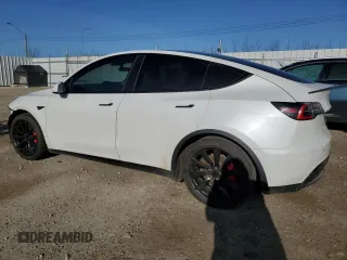 2020 Tesla Model Y Long Range with VIN 5YJYGDEFXLF034617, listed as a Copart auction lot 53235235 with 113,480 mi miles and Salvage Title. Bid and sale history available at DreamBid. Image 2.