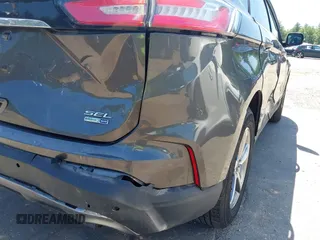 2019 Ford Edge SEL with VIN 2FMPK4J91KBC13436, listed as a IAAI auction lot 42551782 with 77,164 mi miles and . Bid and sale history available at DreamBid. Image 17.