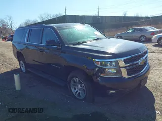 2015 Chevrolet Suburban LT with VIN 1GNSKJKC0FR659093, listed as a IAAI auction lot 41763754 with 165,007 mi miles and . Bid and sale history available at DreamBid. Image 1.