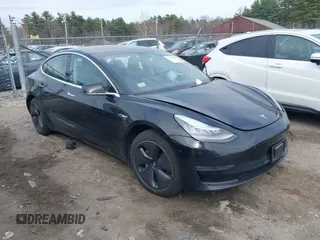 2018 Tesla Model 3 Long Range Battery z VIN 5YJ3E1EB3JF127410, wystawiony jako IAAI lot #41994858 z przebiegiem 100 494 mil mil oraz . Historia ofert i sprzedaży dostępna na DreamBid. Obrazek 1.