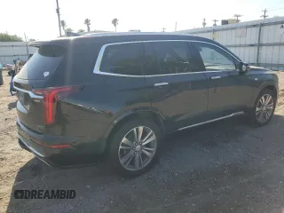 2021 Cadillac XT6 Premium Luxury with VIN 1GYKPCRS4MZ199110, listed as a Copart auction lot 51798905 with 66,486 mi miles and Salvage Title. Bid and sale history available at DreamBid. Image 3.