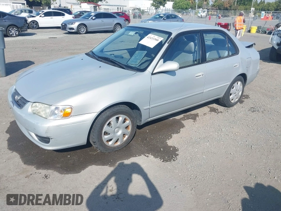 2002 Toyota Corolla CE with VIN 1NXBR12EX2Z637420, listed as a IAAI auction lot 42433300 with 98,353 mi miles and . Bid and sale history available at DreamBid. Image 2.