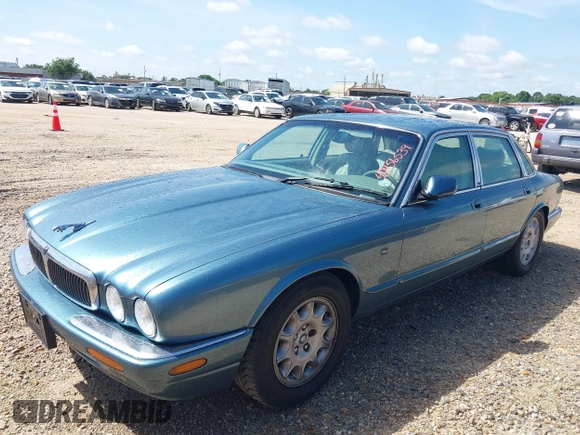 1998 Jaguar XJ with VIN SAJHX1241WC819418, listed as a IAAI auction lot 42456539 with 126,457 mi miles and . Bid and sale history available at DreamBid. Image 2.