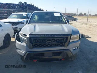 2023 Nissan Frontier Pro-4X with VIN 1N6ED1EK7PN604374, listed as a IAAI auction lot 41828936 with 60,452 mi miles and . Bid and sale history available at DreamBid. Image 12.