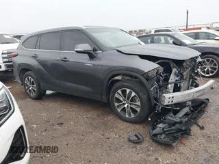 2021 Toyota Highlander Hybrid XLE z VIN 5TDHARAH5MS011961, wystawiony jako IAAI lot #42153448 z przebiegiem 87 064 mil mil oraz . Historia ofert i sprzedaży dostępna na DreamBid. Obrazek 1.