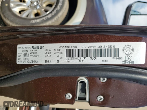 2015 Ram 1500 Laramie Limited with VIN 1C6RR7WM7FS668236, listed as a Copart auction lot 58981325 with 53,099 mi miles and Salvage title. Bid and sale history available at DreamBid. Image 12.