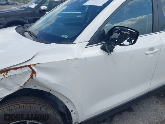 2018 Mazda CX-5 Touring z VIN JM3KFACM6J1419663, wystawiony jako IAAI lot #41879677 z przebiegiem 115 224 mil mil oraz . Historia ofert i sprzedaży dostępna na DreamBid. Obrazek 19.