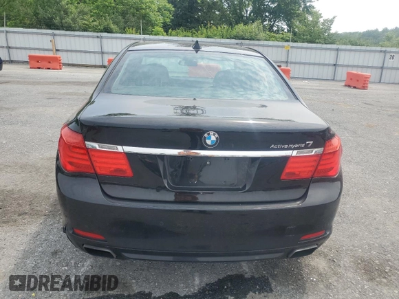 2012 BMW 7 Series with VIN WBAKX6C52CC197154, listed as a Copart auction lot 59897855 with 114,279 mi miles and Clean title. Bid and sale history available at DreamBid. Image 6.