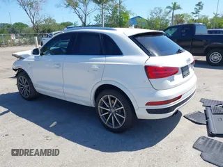 2018 Audi Q3 Premium Plus z VIN WA1JCCFS3JR028436, wystawiony jako IAAI lot #42067256 z przebiegiem 63 722 mil mil oraz . Historia ofert i sprzedaży dostępna na DreamBid. Obrazek 3.