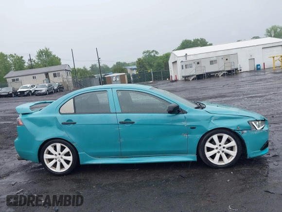 2013 Mitsubishi Lancer GT with VIN JA32U8FW6DU022878, listed as a IAAI auction lot 42449708 with 121,869 mi miles and . Bid and sale history available at DreamBid. Image 13.