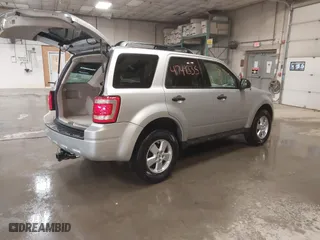 2010 Ford Escape XLT with VIN 1FMCU0DG5AKB02811, listed as a IAAI auction lot 41749335 with 103,071 mi miles. Bid and sale history available at carsss.com. Image 4.
