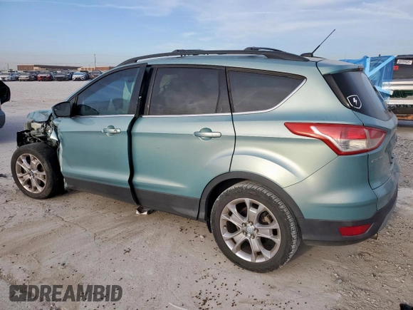 2013 Ford Escape SE with VIN 1FMCU0G97DUC34491, listed as a Copart auction lot 50516525 with 133,764 mi miles and Salvage title. Bid and sale history available at DreamBid. Image 2.