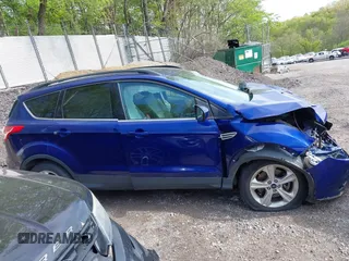 2016 Ford Escape SE z VIN 1FMCU0G90GUB57287, wystawiony jako IAAI lot #42170920 z przebiegiem 76 703 mil mil oraz . Historia ofert i sprzedaży dostępna na DreamBid. Obrazek 13.