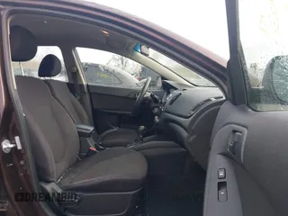 2011 Kia Forte EX with VIN KNAFU4A2XB5444513, listed as a IAAI auction lot 42002807 with 233,408 mi miles. Bid and sale history available at carsss.com. Image 5.