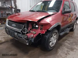2003 Ford Escape XLT Popular 2 with VIN 1FMCU93173KA52806, listed as a IAAI auction lot 41696250 with 138,338 mi miles. Bid and sale history available at carsss.com. Image 6.