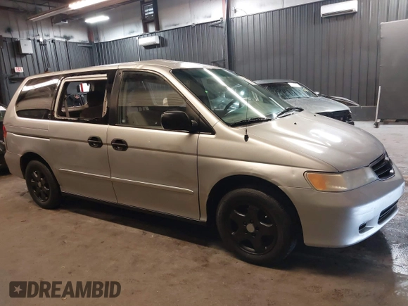 2002 Honda Odyssey LX z VIN 2HKRL18532H573727, wystawiony jako IAAI lot #42266783 z przebiegiem 127 491 mil mil oraz . Historia ofert i sprzedaży dostępna na DreamBid. Obrazek 14.