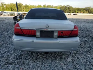 1999 Mercury Grand Marquis LS with VIN 2MEFM75WXXX682027, listed as a Copart auction lot 53906165 with 116,616 mi miles and Salvage Title. Bid and sale history available at DreamBid. Image 6.