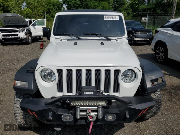 2023 Jeep Wrangler Sport with VIN 1C4HJXDGXPW596127, listed as a Copart auction lot 65395655 with 64,257 mi miles and Salvage title. Bid and sale history available at DreamBid. Image 5.