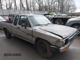 1992 Toyota Pickup DLX z VIN JT4RN93PXN5057323, wystawiony jako IAAI lot #41927475 z przebiegiem 270 675 mil mil oraz . Historia ofert i sprzedaży dostępna na DreamBid. Obrazek 1.