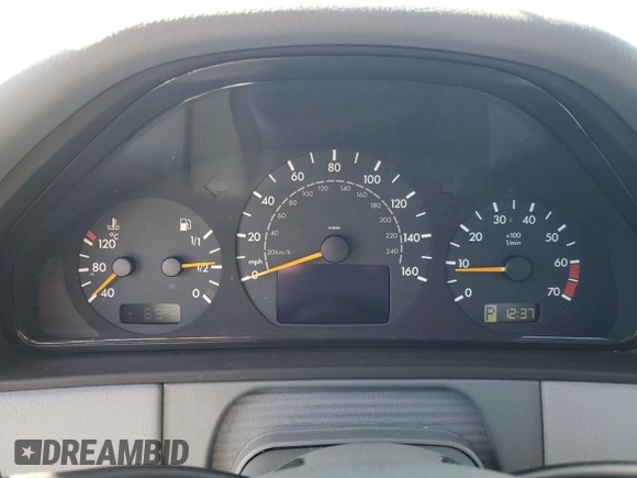 2002 Mercedes-Benz E-Class with VIN WDBJF65J82B478924, listed as a Copart auction lot 87767635 with 154,377 mi miles and Salvage Title. Bid and sale history available at carsss.com. Image 9.