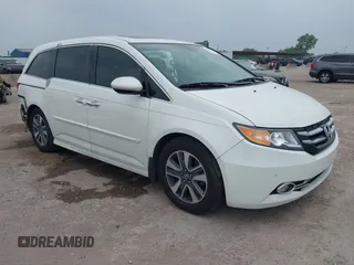 2014 Honda Odyssey Touring с VIN 5FNRL5H97EB066441, выставлен на аукционе IAAI как лот 42280734 с пробегом 265 516 миль миль и . История ставок и продаж доступна на DreamBid. Изображение 1.