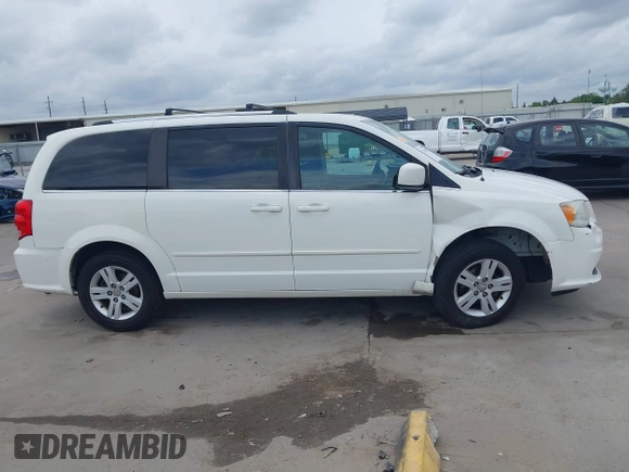 2011 Dodge Grand Caravan Crew with VIN 2D4RN5DGXBR786592, listed as a IAAI auction lot 42114198 with 243,423 mi miles and . Bid and sale history available at DreamBid. Image 13.