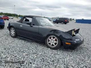 1994 Mazda MX-5 Miata with VIN JM1NA3534R0513305, listed as a Copart auction lot 52489865 with 150,481 mi miles and Salvage title. Bid and sale history available at DreamBid. Image 4.