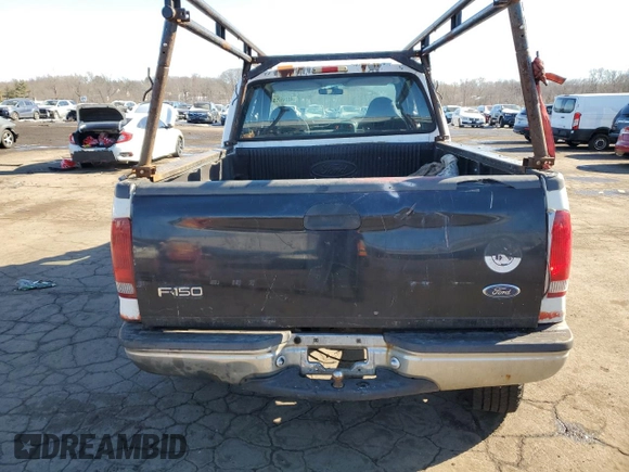1999 Ford F-250 XL with VIN 1FTNX21L0XEB46210, listed as a Copart auction lot 45749725 with 221,529 mi miles and Salvage title. Bid and sale history available at DreamBid. Image 6.