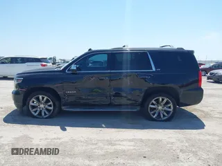 2015 Chevrolet Tahoe LTZ with VIN 1GNSCCKC4FR309152, listed as a IAAI auction lot 42029341 with 187,313 mi miles and . Bid and sale history available at DreamBid. Image 14.