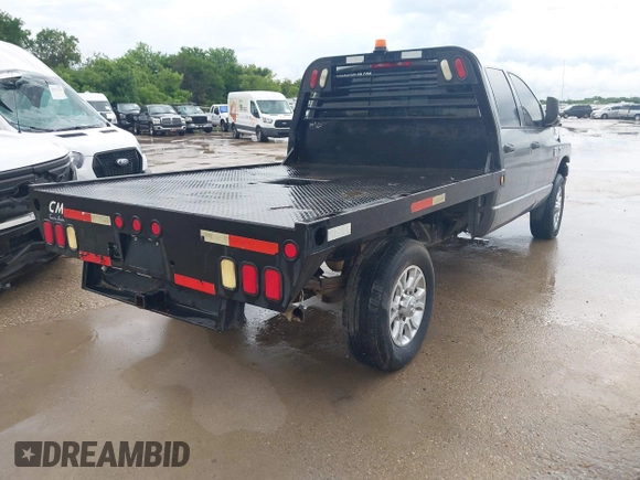 2009 Dodge Ram 2500 ST with VIN 3D7KS28LX9G550043, listed as a IAAI auction lot 42166803 with 291,899 mi miles. Bid and sale history available at carsss.com. Image 4.