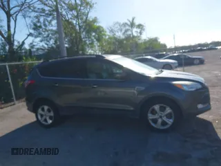 2016 Ford Escape SE with VIN 1FMCU9GX3GUB78749, listed as a IAAI auction lot 42030262 with 93,365 mi miles. Bid and sale history available at carsss.com. Image 13.